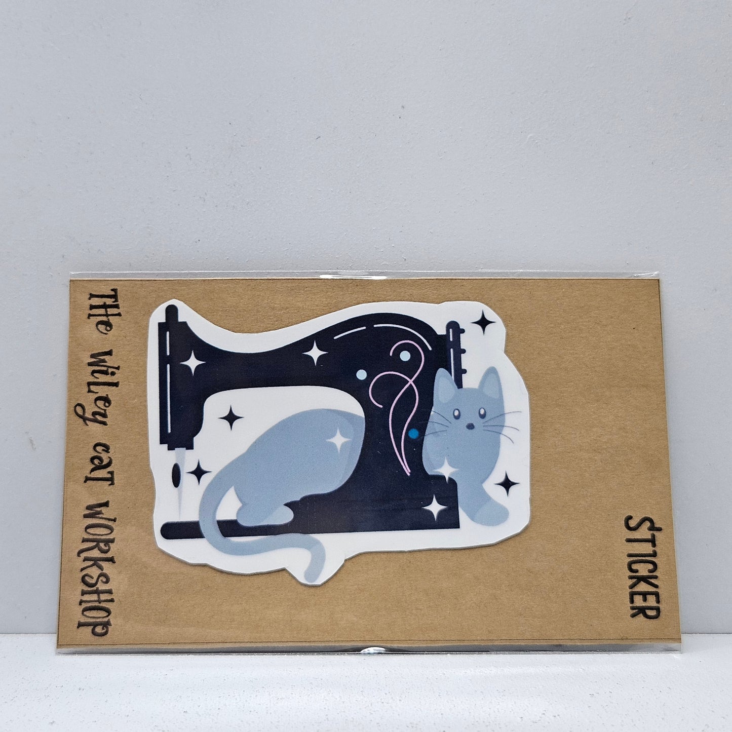 Grey Cat on the Sewing Machine Vinyl Sticker