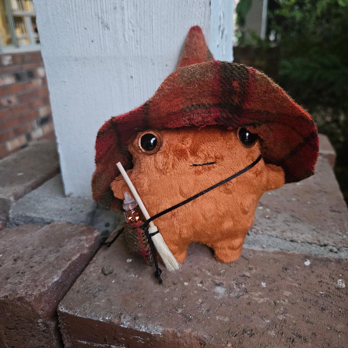 plush frog with hat
