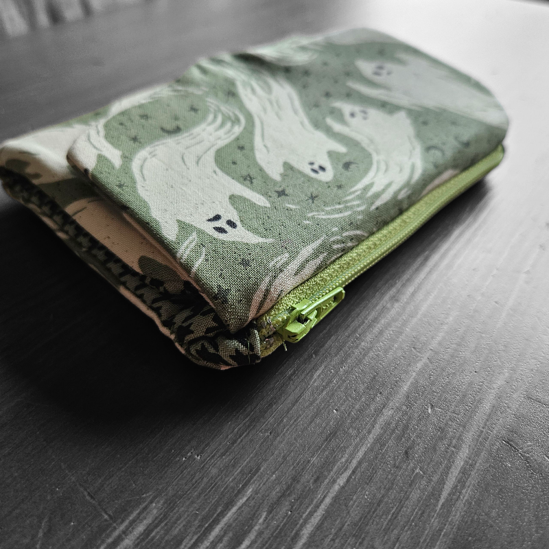 Folded fabric with ghost pattern on a wooden surface