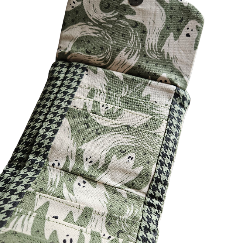 Folded fabric with ghost pattern on a white background