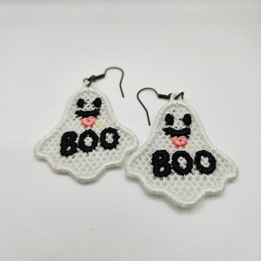 Crocheted earrings with 'BOO' and 'XOXO' text on a light gray background